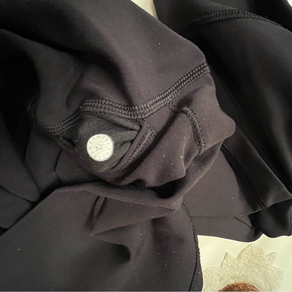 Like new Wunder under Train high rise Crops 21in and one 25 in. All size 2